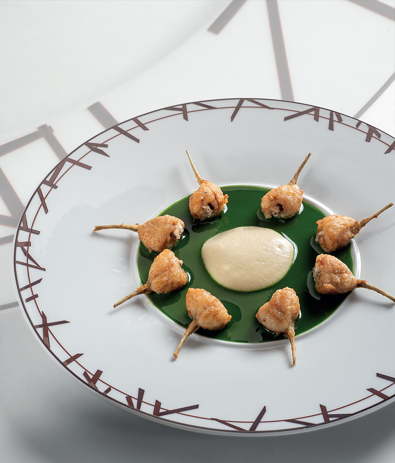 Jambonnettes de grenouilles à la purée d'ail et au jus de persil
